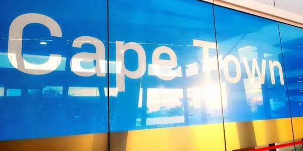 Cape Town airport sign with blue background.